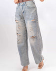 Jeans Vintage Con Strappi